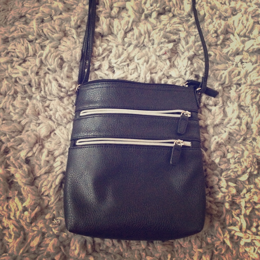 Black medium sized crossbody bag.
